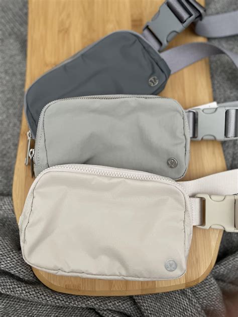 Could carry everything I needed plus a water bottle (either a small one or flexible). . Lululemon belt bag size